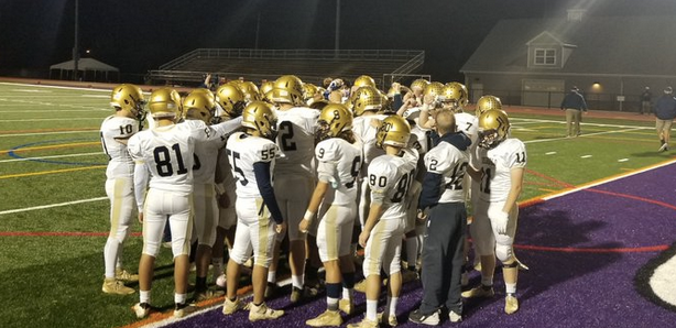 The Colonials huddle together at their final game on Nov 20, 2020